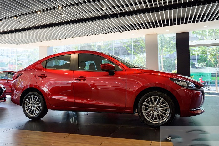 than xe mazda 2 1 Mazda 2